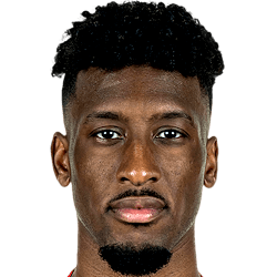 K. Coman